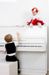 two kids near the piano