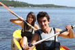 Teenagers kayaking