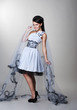 Foto: beautiful bride is standing in wedding dress beautiful bride is standing in wedding dress