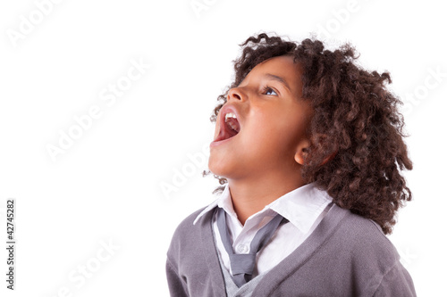 Photo: Portrait of a cute african little boy screaming Portrait of a cute african little boy screaming