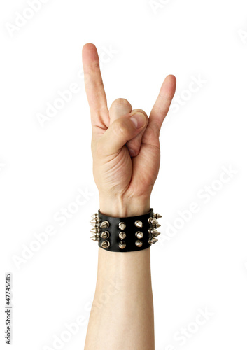 Photo: Hand of rocker in leather bracelet. Hand of rocker in leather bracelet.