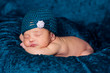 Newborn Baby Girl Wearing a Teal Flapper Style Hat