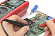 Foto: Examining a pcb Examining a pcb