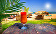 Wonderful goblet of cocktail opposite exotic beach.