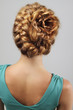 Woman with beautiful hairstyle on light background