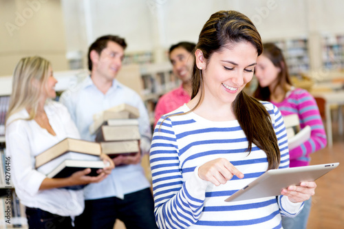 Photo: Woman with an e-book reader Woman with an e-book reader