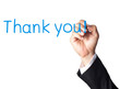 businessman hand writing thank you on white board