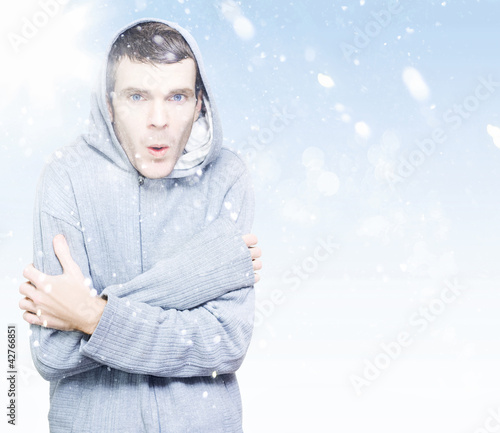 Photo: Man freezing in cold winter snow Man freezing in cold winter snow