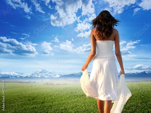 Photo: Enjoying pure freedom | Woman on a meadow Enjoying pure freedom | Woman on a meadow