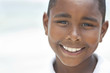 Happy African American Boy On Beach