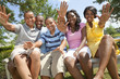 Happy African American Family Parents and Children Waving