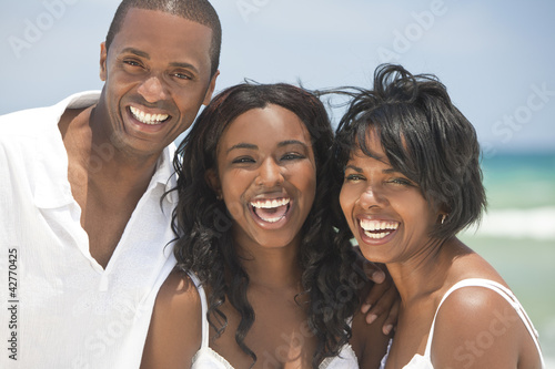Photo: Happy African American Family On Beach Happy African American Family On Beach