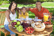 African American Family Eating Healthy Food Outside
