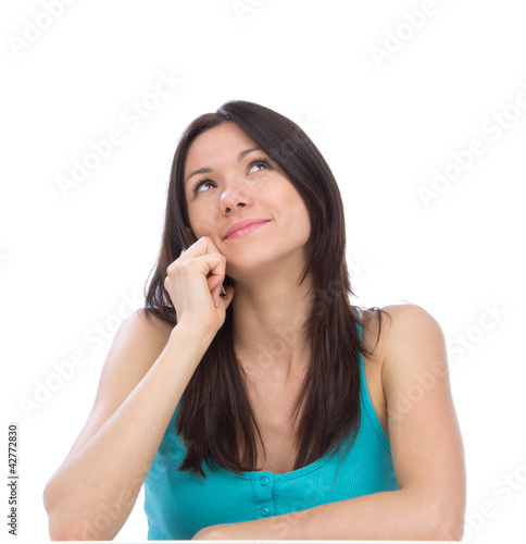 Foto: woman talking on the phone, smiling and looking up in office woman talking on the phone, smiling and looking up in office