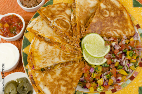Photo: Mexican Spicy Chicken Tinga Quesadillas & Side Dishes Mexican Spicy Chicken Tinga Quesadillas & Side Dishes