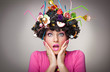 beautiful  surprised female  with lollipops in the hair