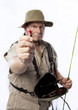 Fly fisherman holding out his favourite bait.
