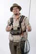 Happy fly fisherman with all his tackle.