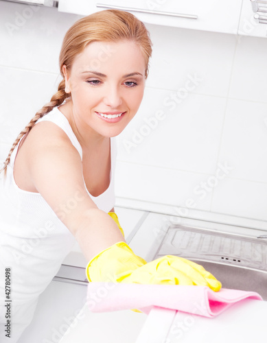 Photo: housewife cleaning furniture housewife cleaning furniture