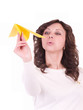Beautiful young woman with paper airplanes