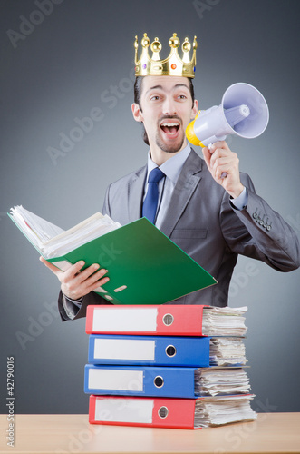 Photo: Man with crown and loudspeaker Man with crown and loudspeaker