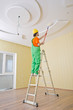 Painter worker during painting job