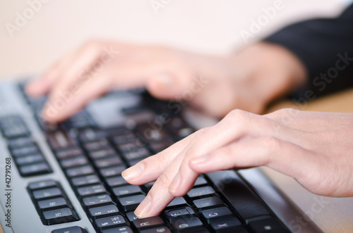 Photo: Hands typing on the keyboard Hands typing on the keyboard