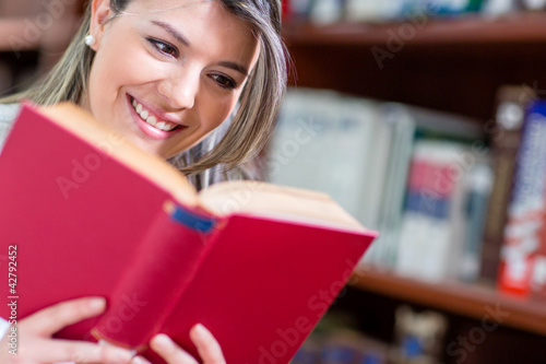 Photo: Woman reading a book Woman reading a book