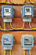 A row of electric meters measuring power use