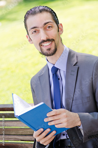 Photo: Young businessman on the street Young businessman on the street