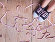 Photo: The problem - childs feet and long twisted shoelaces The problem - childs feet and long twisted shoelaces