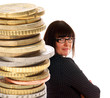 Business woman and a stack of Euro Coins