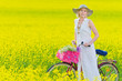 Photo: Woman and bicycle Woman and bicycle