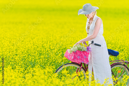 Photo: Woman and bicycle Woman and bicycle