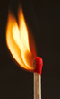 head of a match starting to burn