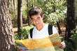 Photo: portrait of a young man with map portrait of a young man with map
