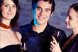 Foto: Young happy people with champagne at party Young happy people with champagne at party