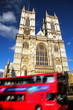 Westminster Abbey cathedral with city bus in London, UK
