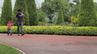 Video: Asian Father And Son Walk In The Park Together Asian Father And Son Walk In The Park Together