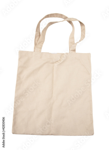 Photo: Brown cotton bag on white isolated background Brown cotton bag on white isolated background