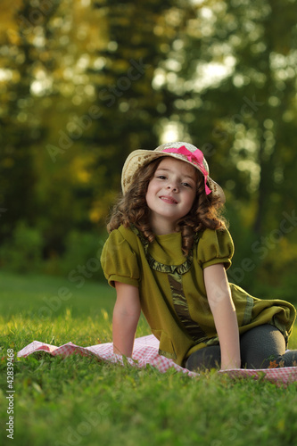 Photo: beauty girl on grass outdoors beauty girl on grass outdoors
