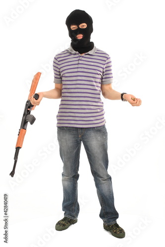 Photo: Terrorist with submachine gun. Terrorist with submachine gun.