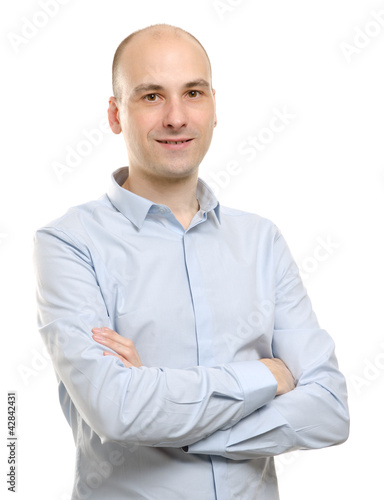Photo: smiling businessman looking at camera smiling businessman looking at camera