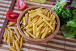 Uncooking italian pasta in bowl