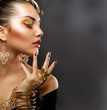Fashion Girl Portrait. Golden Makeup