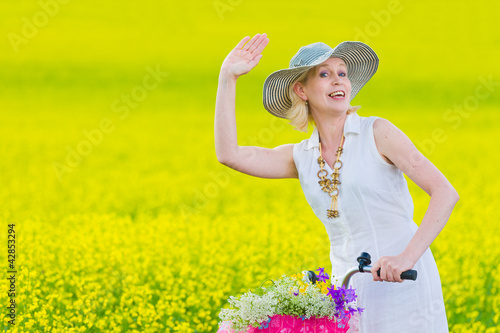 Photo: Woman waving Woman waving