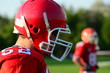 american football player wearing red helmet