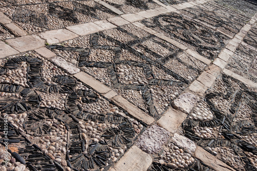 Photo: Pebbles stone square road texture Pebbles stone square road texture