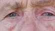 Wrinkled face of old woman