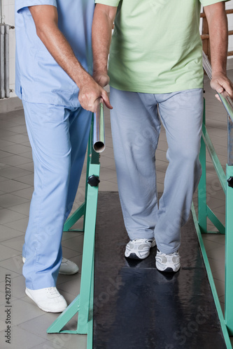 Photo: Senior Man having ambulatory therapy Senior Man having ambulatory therapy
